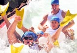 Participants sitting on an inflatable beach mattress try to cross a pool of water and foam near the Siberian city of Krasnoyarsk, where holidaymakers have gathered to mark the end of the Siberian summer, on Saturday.