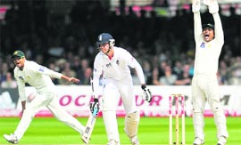 England's Stuart Broad falls LBW to Pakistan's Saeed Ajmal on the third day of the fourth Test match at the Lord's Cricket Ground in London on Saturday.
