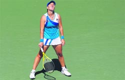 Svetlana Kuznetsova of Russia reacts to a poor shot against Dominika Cibulkova of Slovakia during the US Open in New York on Monday.