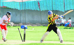 Naman Sharma of Chandigarh Challengers bowled by Sumit Kalia of Reebok during the JCDICL-3 League in Sirsa on Tuesday