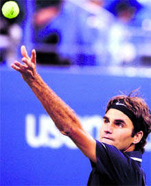 Roger Federer serves against Robin Soderling at the Flushing Meadows in New York on Wednesday night