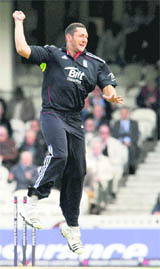 England's Tim Bresnan celebrates after claiming the wicket of Pakistan's Kamran Akmal during the third ODI at the Oval cricket ground, London, on Friday.