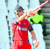 Highveld Lions Richard Cameron celebrates winning over Guyana in the Champions League Twenty20 League match in Johannesburg on Sunday
