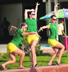 Members of Australian synchronized swimming team strike a pose at the CWG village in New Delhi on Wednesday.