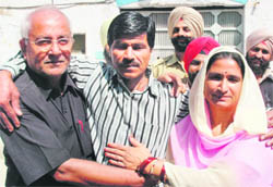 Wasil Khan (centre) along with his sister Mohazra Khatoon and brother-in-law Shaahid Raza Khan after his release in Amritsar on Friday