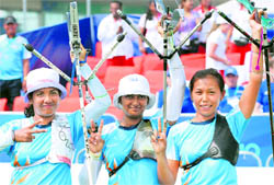 Indian women archers Deepika Kumari, Bombayala Devi Laishram and Dola Banerjee celebrate after winning gold in women�s team recurve in New Delhi on Friday