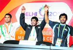 Wrestling winners, Narsingh Yadav, Sushil Kumar, and Yogeshwar Dutt at a Press conference in Delhi on Monday.