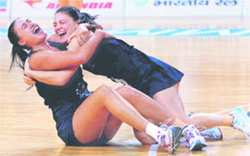 New Zealand players celebrate after beating Australia to clinch gold in women�s netball event in New Delhi on Thursday. 