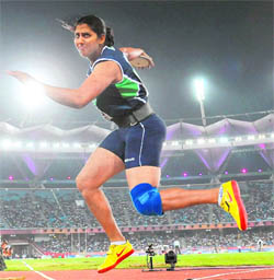 Krishna Poonia competes during the discus women's final. Poonia led an Indian clean sweep in the women's discus final, winning the gold medal with a throw of 61.51 m
