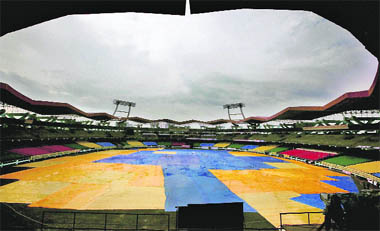 Ground covered with plastic sheets after rains ahead of the first ODI between India and Australia in Kochi 