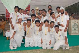 Players with the trophy in Bathinda
