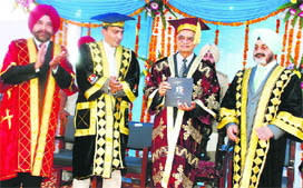 Punjab Governor Shivraj Patil (centre) releases a brochure at the 11th convocation of the Punjab Police Academy at Phillaur on Friday. PS Gill, DGP, Punjab (right) is also seen