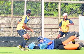 A match in progress during the All India GGS Gold Cup hockey tournament in Ludhiana on Wednesday