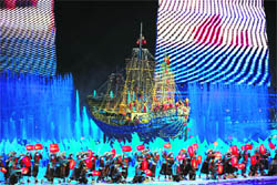 Dragon in full sway: Artists perform with a boat on stage during the opening ceremony of the 16th Asian Games in Guangzhou on Friday. The Asian Games officially opened with a glitzy gala ceremony, culminating years of planning for a massive event that is set to reinforce China's regional sporting dominance.
