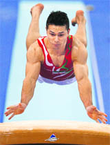 Iran's Mohammad Ramezannpour performs on the vault during the men's artistic gymnastics event in Guangzhou on Saturday.