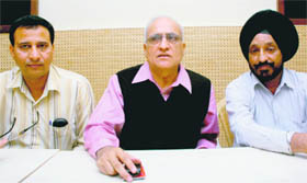 Office-bearers of the RTI Activists Federation during a press conference at the Chandigarh Press Club on Wednesday