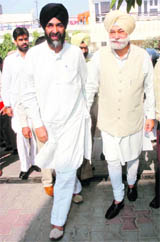 Manpreet Singh Badal and Bir Devinder Singh at the latter�s residence in Patiala on Friday.