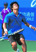 Somdev Devvarman falls to the ground after winning 6-1, 6-2 against Denis Istomin of Uzbekistan during the men�s singles final in Guangzhou