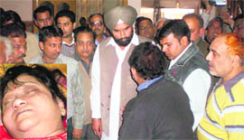 Congress MLA Darshan Brar inquires about the death of a married woman, Anu (inset), from her parents at Moga on Sunday.