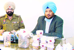 SP (Detective) Gurdeep Singh Pannu (in civil dress) speaking to mediapersons in Patiala