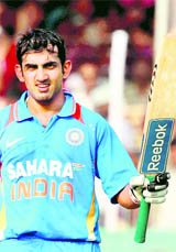Gambhir celebrates his century in Vadodara on Saturday.