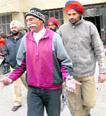 Darbara Singh comes out of the district court premises in Jalandhar on Friday
