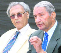 Dr Gurdev Singh Khush (R) makes a point in Ludhiana on Saturday. Next to him is PAU Vice-Chancellor MS Kang.