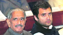 Congress leaders Rahul Gandhi and RK Dhawan. Rahul said he would speak on WikiLeaks issue on Sunday.