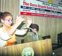 Nikki Guninder Kaur Singh addresses the audience at Punjabi University in Patiala