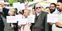 RTI activists protest against lacunae in implementation of the RTI Act by the Punjab Information Commission in Chandigarh