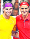Switzerland's Roger Federer and Spain's Rafael Nadal (L) pose before a charity match for the benefit of African children in Zurich on Tuesday
