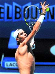 Rafael Nadal of Spain serves during a training session ahead of the Australian Open in Melbourne on Saturday. The tournament begins on Monday.