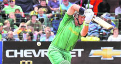 South African captain Graeme Smith (R) plays a shot during the fourth ODI in Port Elizabeth on Friday. Smith scored 18. South Africa posted 265 for 7 in their allotted 50 overs. 