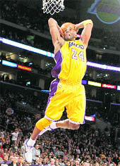 Los Angeles Lakers� Kobe Bryant slam dunks against the Sacramento Kings during their game in California, on Friday. 