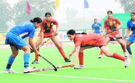 Players in action during the final of the 1st Indian Senior Women�s National Championship between Railways and Haryana at the Motilal Nehru Sports School in Sonepat on Sunday. Railways won the final beating Haryana 7-1.