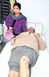 Dr Suman Kumar at the Civil Hospital, Amritsar, on Monday. Sitting beside him is his wife, Dr Sunita Wadhawan.