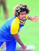 Lasith Malinga bowls during the first ODI against West Indies in Colombo on Monday