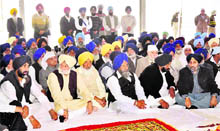 Deputy Chief Minister Sukhbir Singh Badal (extreme right), former Finance Minister Manpreet Singh Badal (extreme left) and other leaders at the bhog ceremony of Joginder Kaur Tohra in Tohra village on Friday.