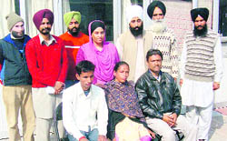 Urmila (seated) along with her son (left) at Kharar.