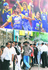 Sri Lankan cricket fans queue up to buy tickets for the Cricket World Cup in Colombo on Monday. Sri Lanka will host 12 games of the 14-nation event.