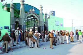 Policemen deployed in strength outside the Makbara Meera Sahib Peer Khana in Bathinda on Tuesday.