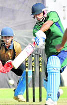 Pradeep Sahu of Haryana plays a shot against Punjab during the North Zone Ranji Trophy ODI tournament at the PCA stadium in Mohali on Thursday. Haryana won by 52 runs