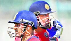 Virender Sehwag (L) and Yusuf Pathan during a training session at the Chinnaswamy stadium in Bangalore on Saturday.