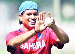 Sachin Tendulkar during a training session ahead of the World Cup Cricket 2011 at Chinnaswamy stadium in Bangalore on Saturday.