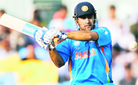 Mahendra Singh Dhoni plays a shot during the warm-up match against New Zealand at the M.A. Chidambaram Stadium in Chennai