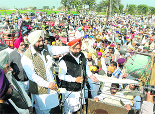 Harpartap Singh Ajnala addresses Congress workers during the gherao of Jhander police station in Amritsar on Wednesday.
