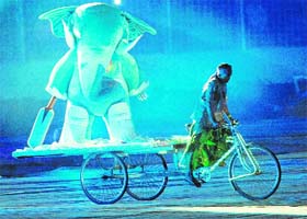 The 2011 Cricket World Cup mascot Stumpy arrives on a cycle rickshaw during the opening ceremony