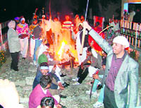 Valmikis stage a protest at Mehna railway station in Moga on Friday.
