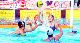 Players of Delhi and Maharashtra in action during Water Pollo semifinal match at the 34th National Games in Ranchi on Friday.