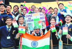 Cricket fans cheer Team India playing their first World Cup match against Bangladesh in Dhaka, in Amritsar